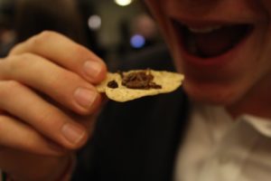 entomo farms whole roasted crickets on chips at the commerce and engineering environmental conference at queens university in ontario