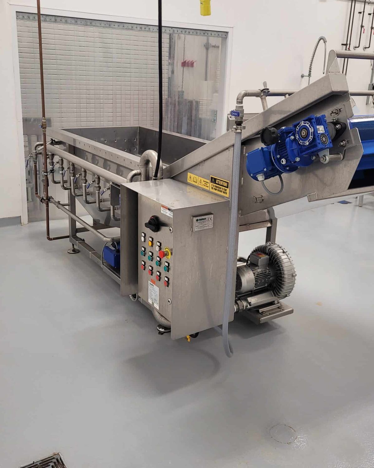 Control panel and conveyor at the Entomo Farms washing line